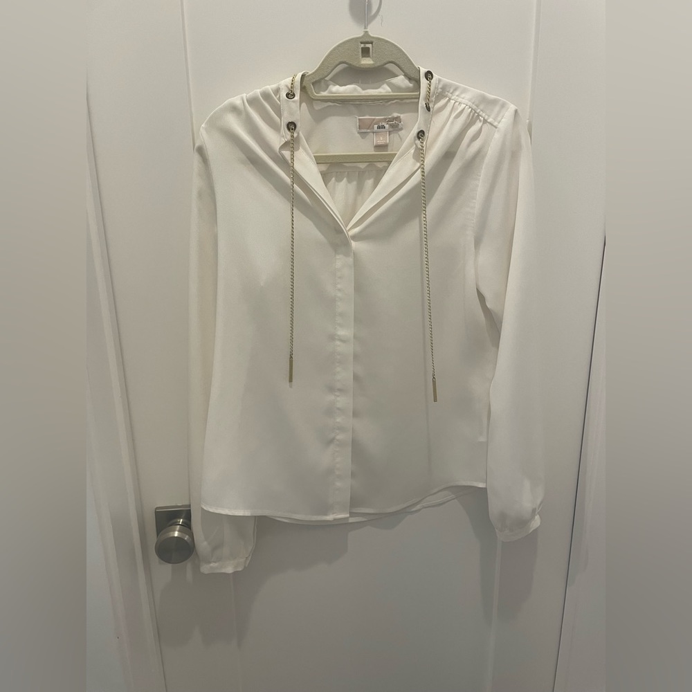 White Small silk button down with metal hardware.